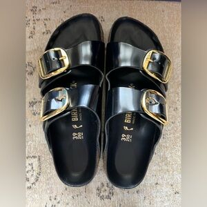 Birkenstock Glossy Black Slides with Gold Accents